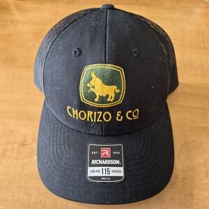 Chorizo & Co Black Trucker Hat with Yellow Embroidered Logo